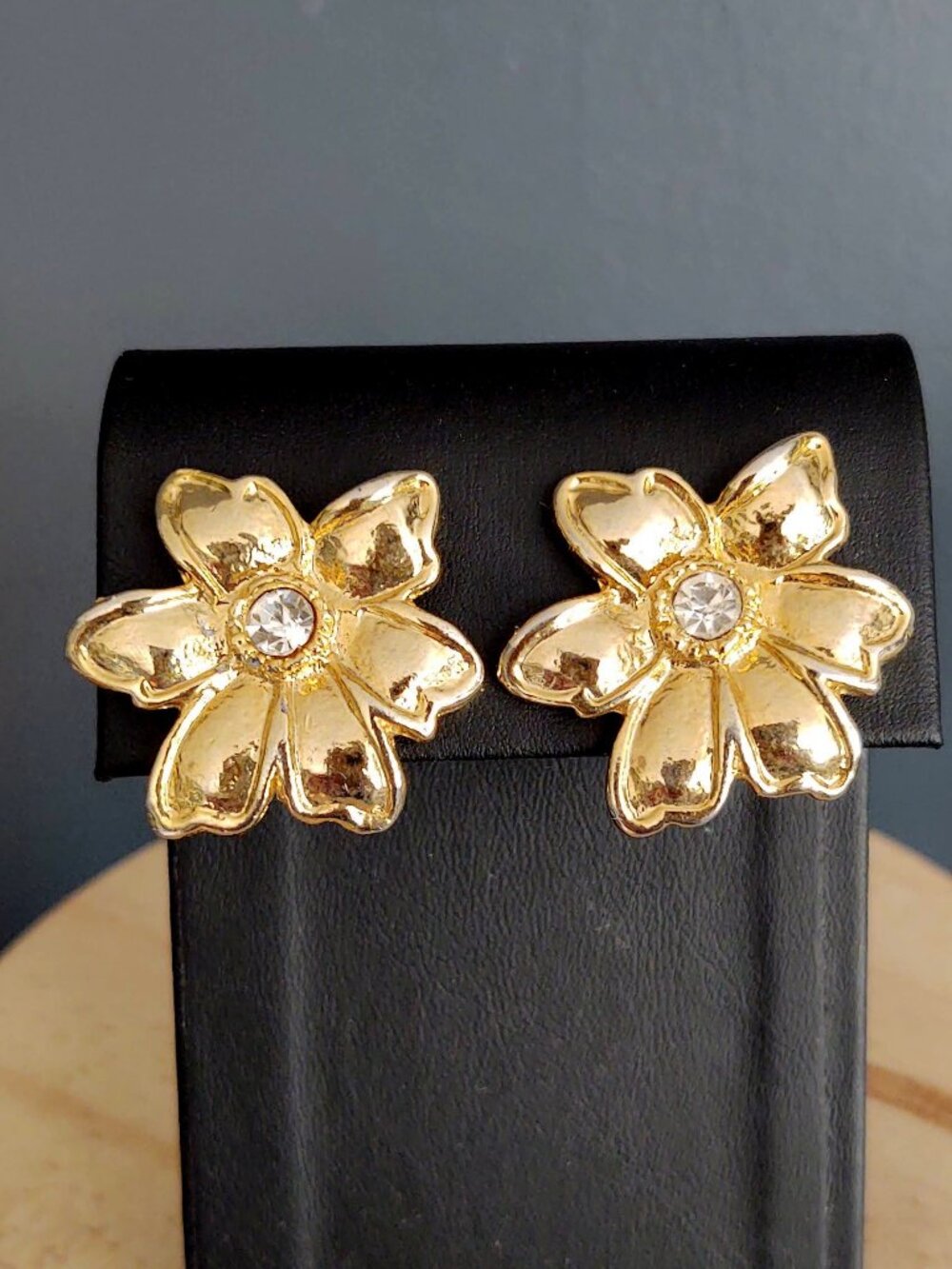 Vintage gold tone clip on flower earrings with cz centers